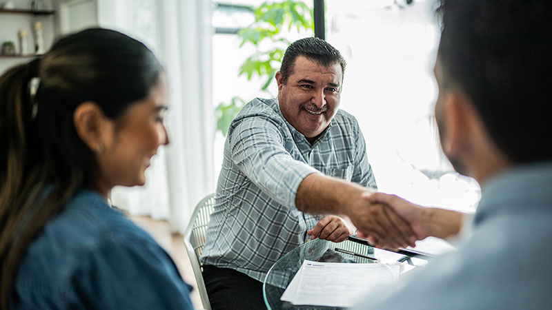 Man striking a deal with a handshake